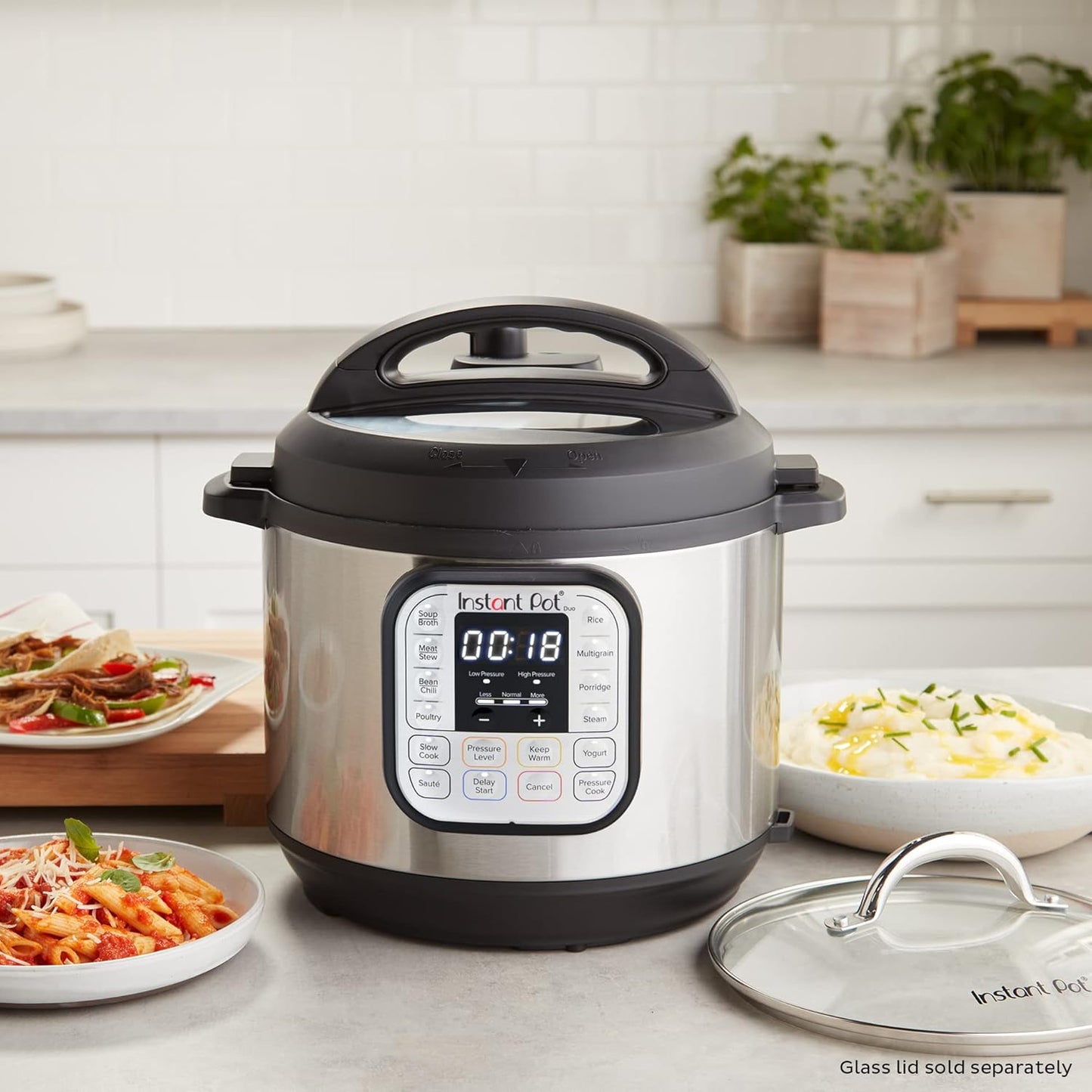 Instant Pot Duo 7-in-1 Multicooker, 5.7L - Pressure Cooker, Slow Cooker, Rice Cooker, Sauté Pan, Yogurt Maker, Steamer and Food Warmer, Brushed Stainless Steel,Black/ Grey