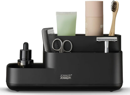 Close-up view of the Joseph Joseph EasyStore Caddy's compartments, showing various sizes and depths for different items