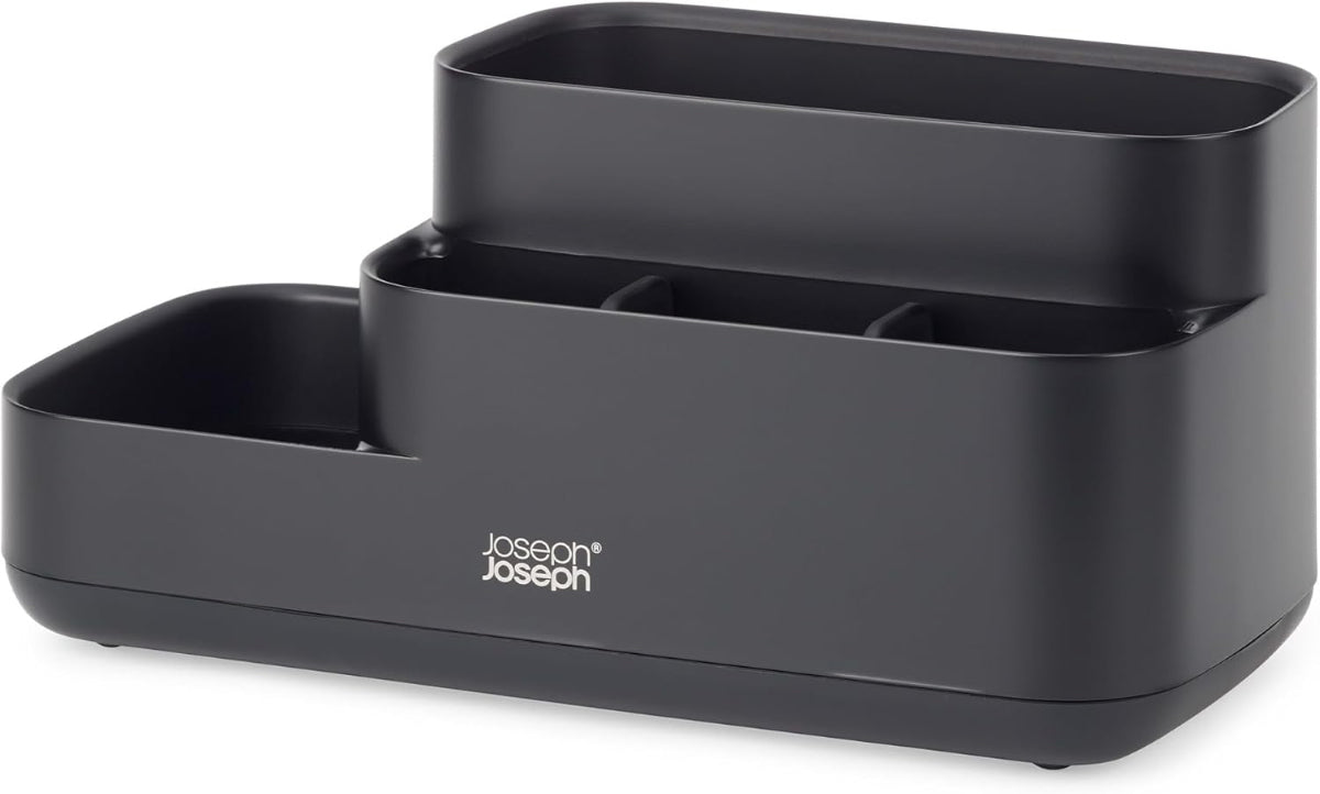Close-up view of the Joseph Joseph EasyStore Caddy's compartments, showing various sizes and depths for different items