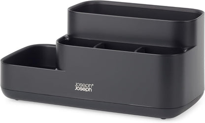Close-up view of the Joseph Joseph EasyStore Caddy's compartments, showing various sizes and depths for different items