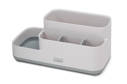 Close-up view of the Joseph Joseph EasyStore Caddy's compartments, showing various sizes and depths for different items